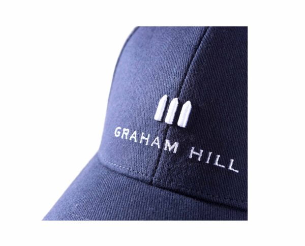 Detail of embroidery on front of GRAHAM HILL cap